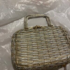 A formal gold woven evening bag